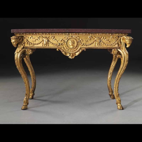 console table with rams leg motif