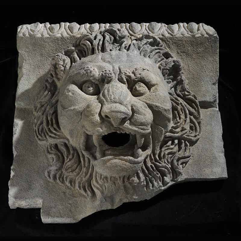 lion's head--wall fragment carved stone