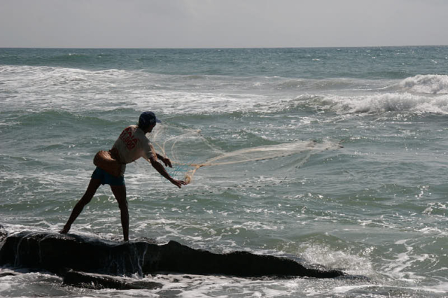 Cast net fishing, northeast coast of Brazil